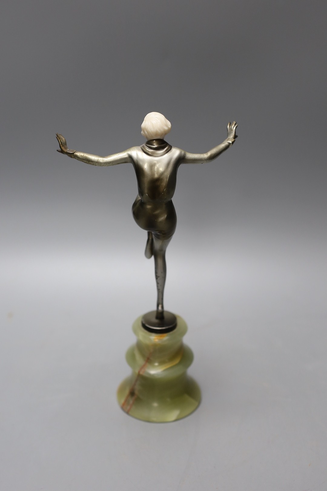 Josef Lorenzl (1892-1950) - Cold painted bronze and ivory figure of a female dancer, raised on an onyx stand, signed 